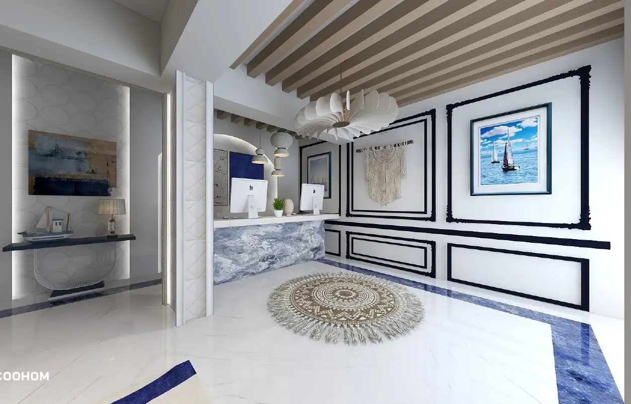 Bright office lobby featuring marble desk, white ceiling light, round rug, and nautical wall art