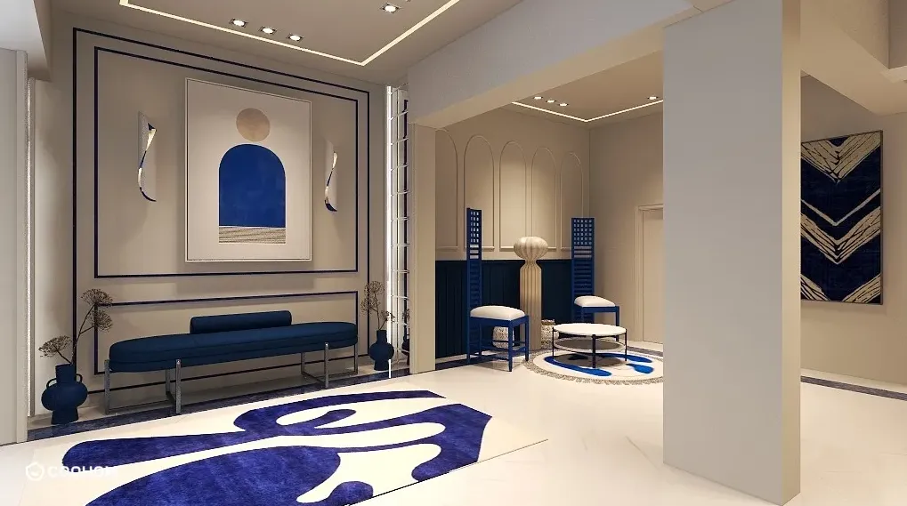 Stylish lounge area with blue sofa, matching chairs, abstract wall art, and soft indoor light