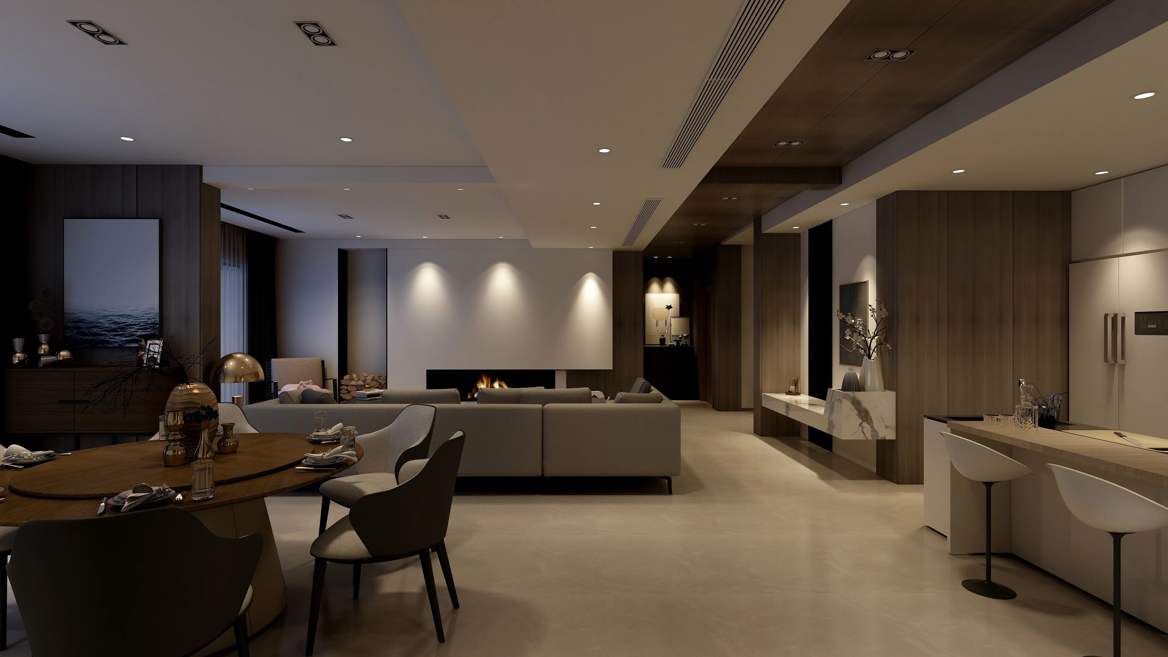 Modern living room with round dining table, grey sofa, fireplace, kitchen area, and warm lighting