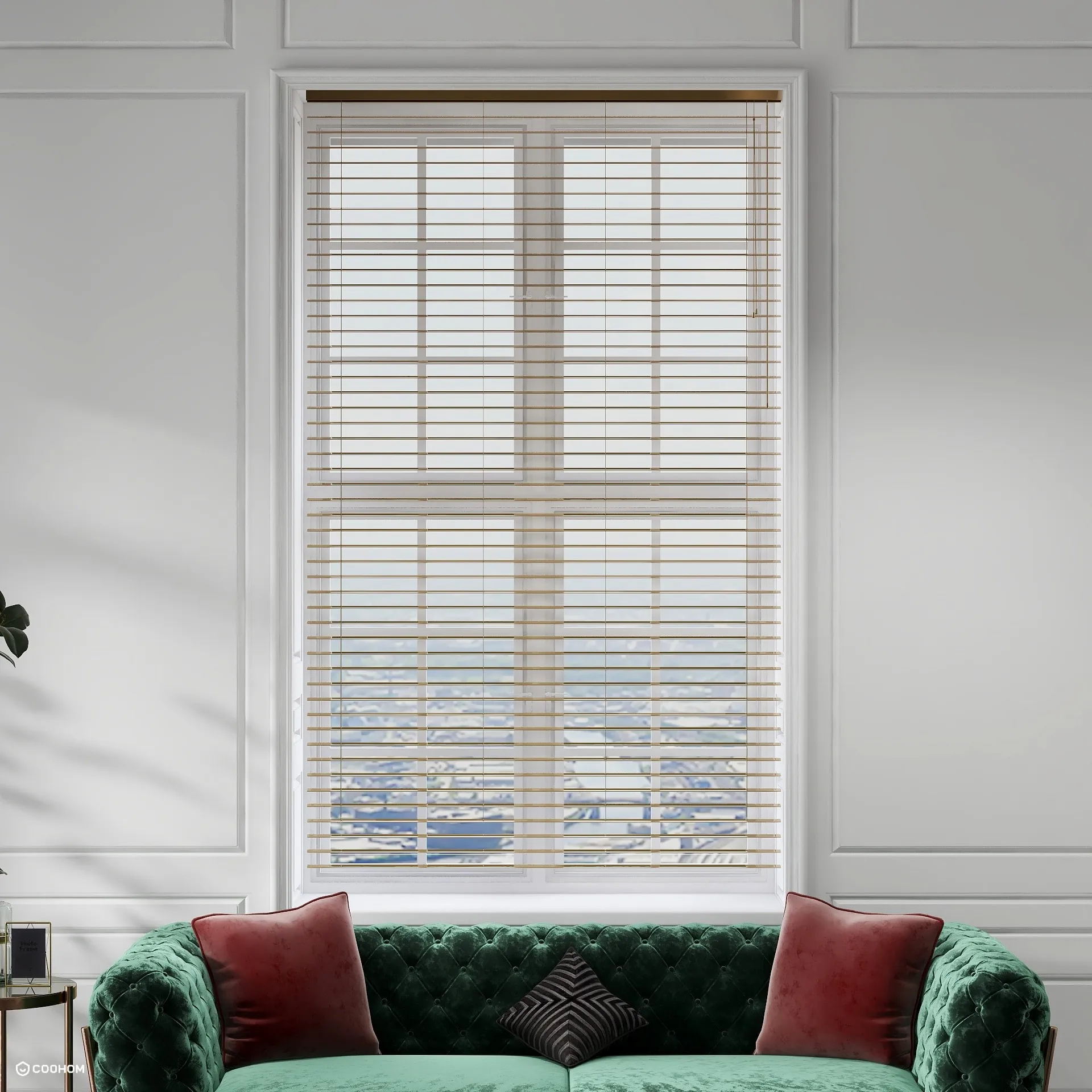 White wall panel room with window blinds above a green sofa with red decorative pillows