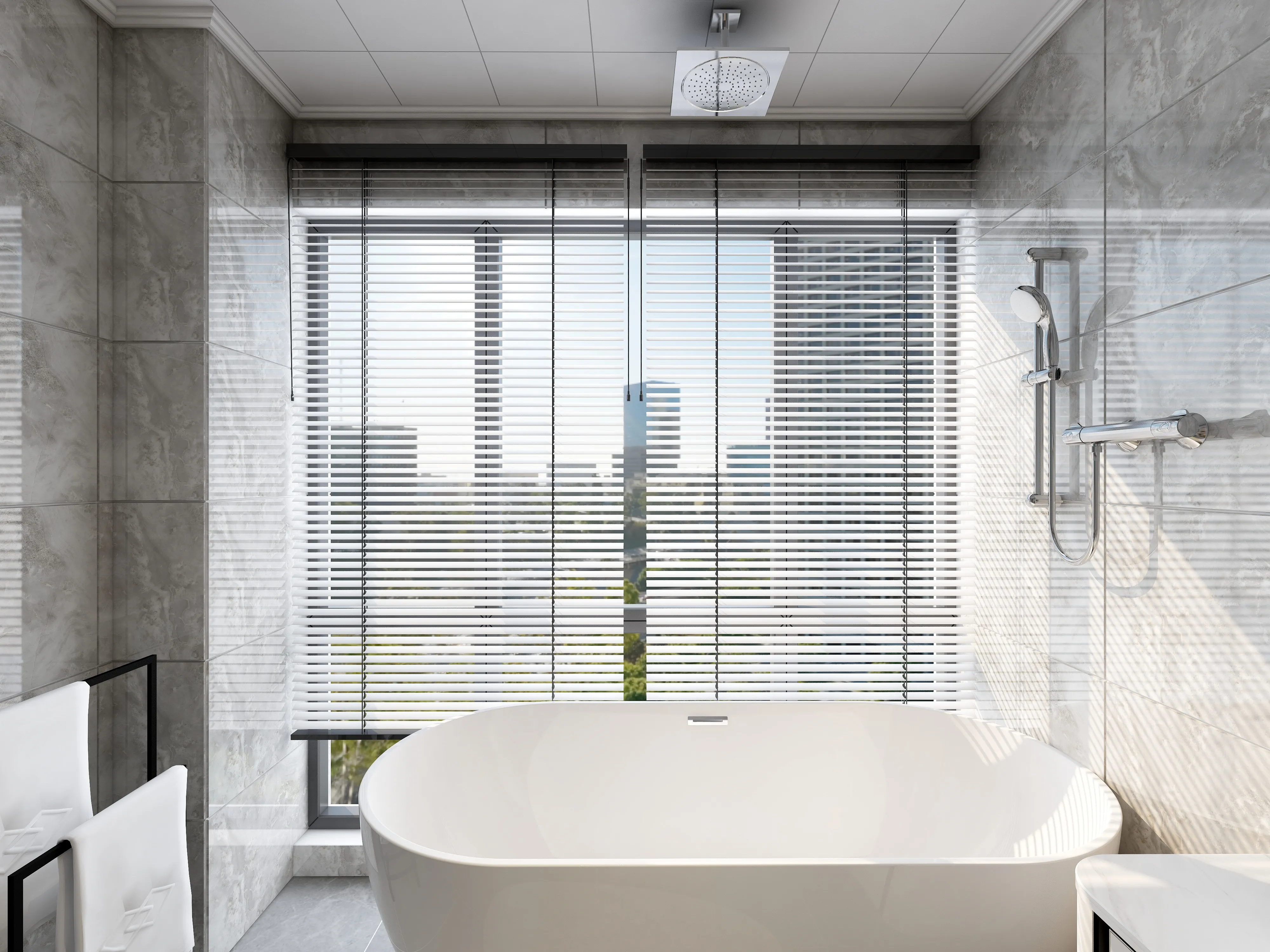 Modern bathroom with white bathtub grey marble walls window blinds and a wall shower fixture