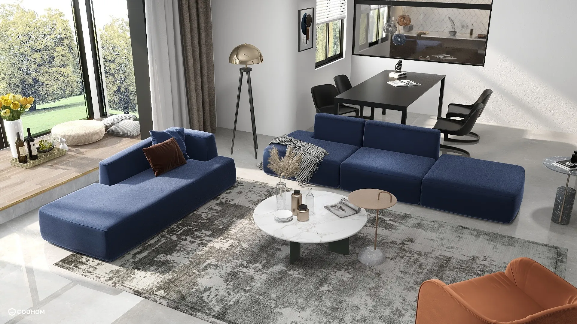 Modern living room featuring blue sofas marble coffee table grey rug dining table and windows